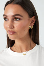 ketting met balletjes en strikje